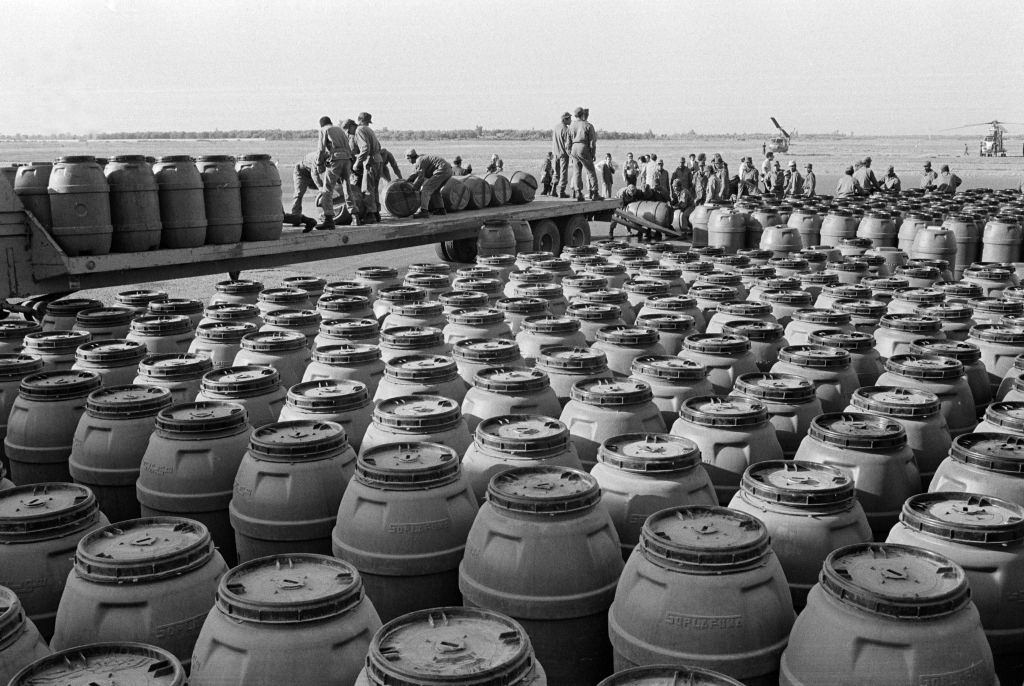 Moroccan soldiers prepare water containers 5 on an air base in Marrakech for the Green March event towards the Spanish border of Western Sahara. 23, October 1975
