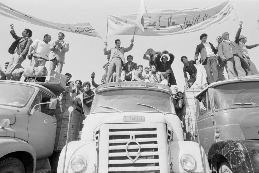 Demonstrators in the Green March step forward to West Sahara. Around 350,000 unarmed Moroccans peacefully occupied the Spanish Sahara, 1975.