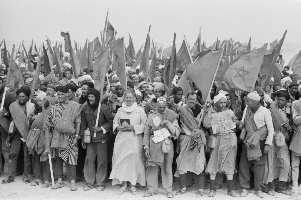 Demonstrators in the Green March step forward to West Sahara, 1975.