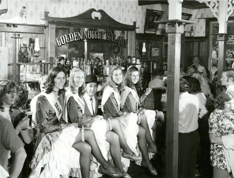 The Can Can girls at the Bar inside the Gold Nugget Hotel on Gala Day, Shanty Town, Westland, January 1973