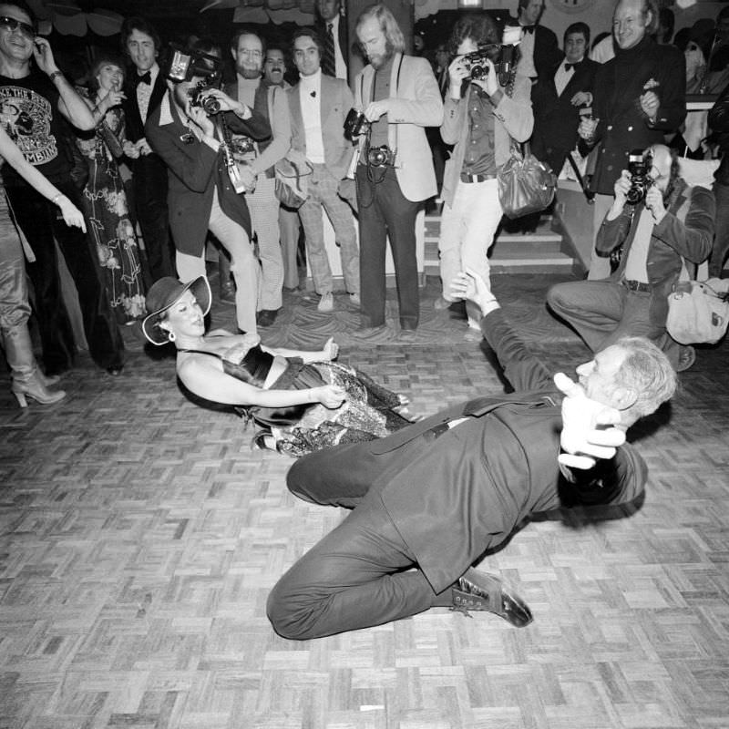 Hitting the deck! These guys get low as they dance in a New York club