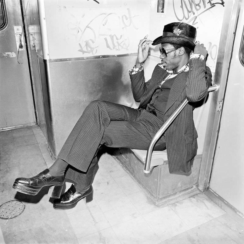 This dapper chap hitches a ride on the subway