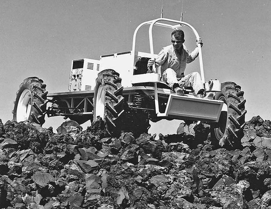 An explosion makes a large test crater on the surface of Black Point lava flow on August 1, 1968, along the Little Colorado River, north of Flagstaff, Arizona.