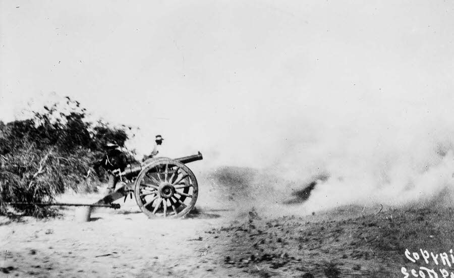 Rebels fire on Ciudad Juarez with a cannon.