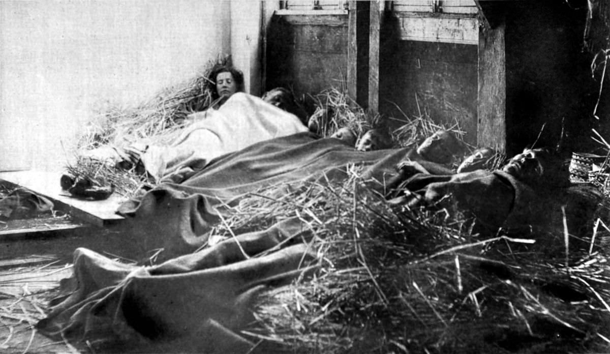 Belgian refugees sleep in a barn in France on Christmas Eve, Dec. 24, 1914.