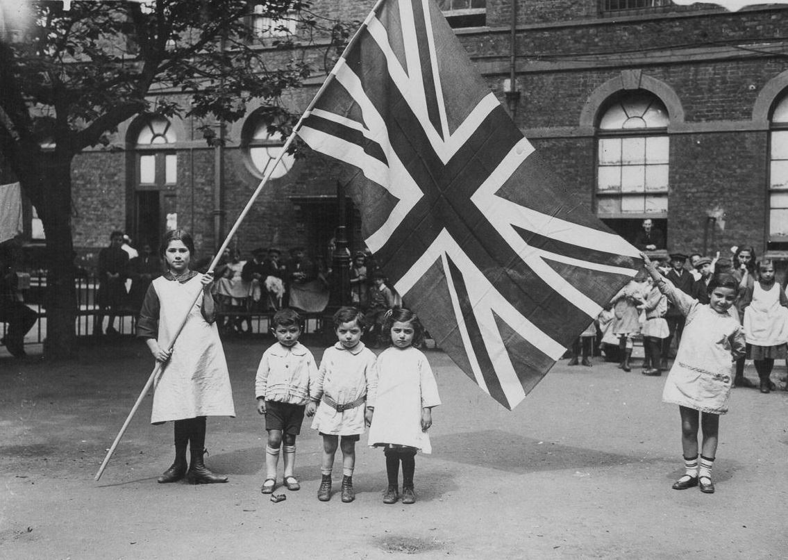 Belgian refugees in London celebrate Independence Day, 1915.