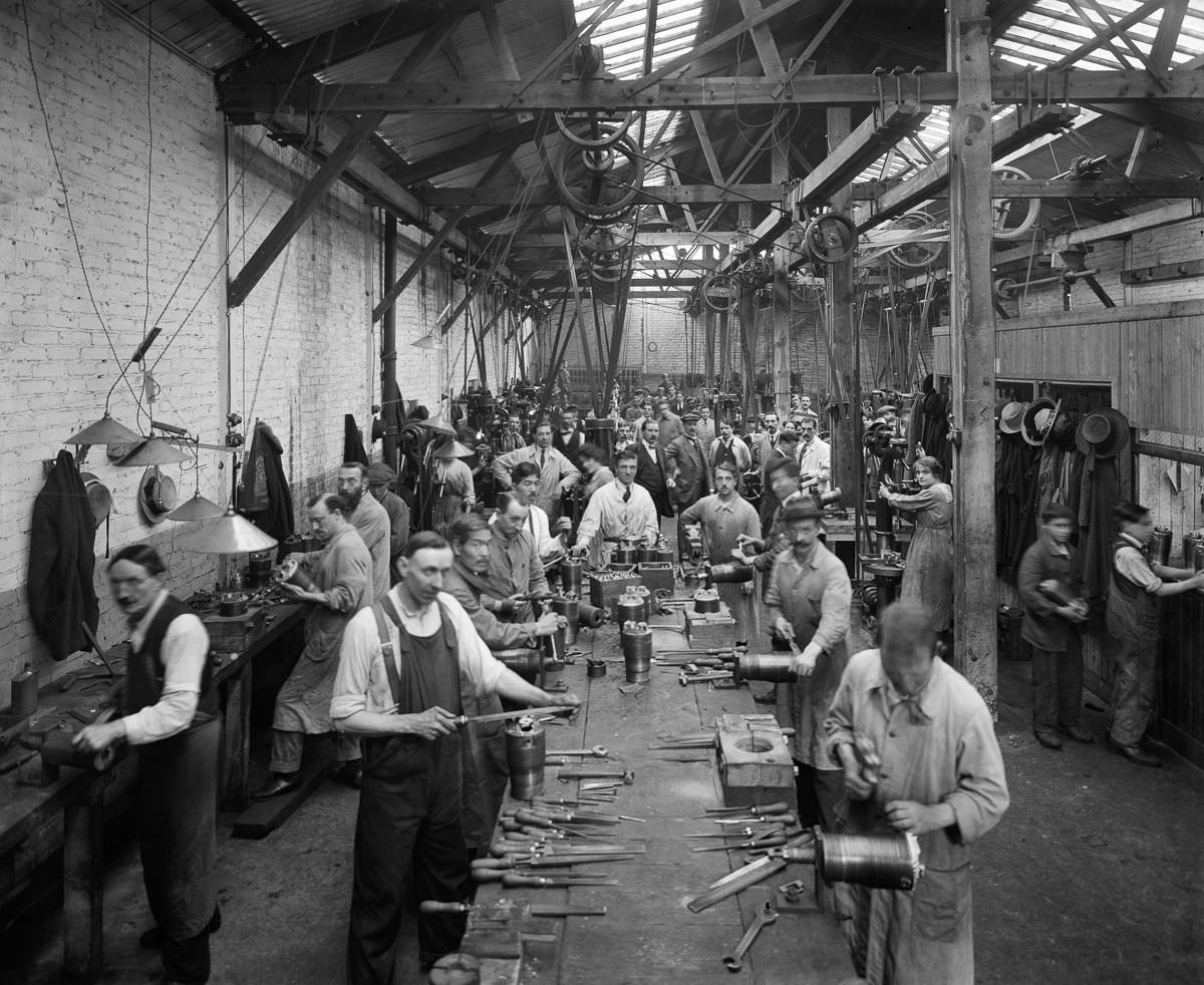 Belgian refugees manufacture artillery shells at the Belgian Munition Works in London, September 1918.