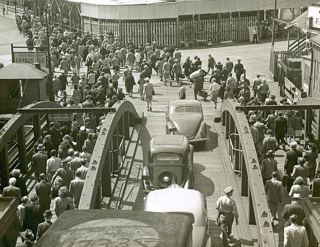 Passengers leaving ferry in Brooklyn, 1950s.
