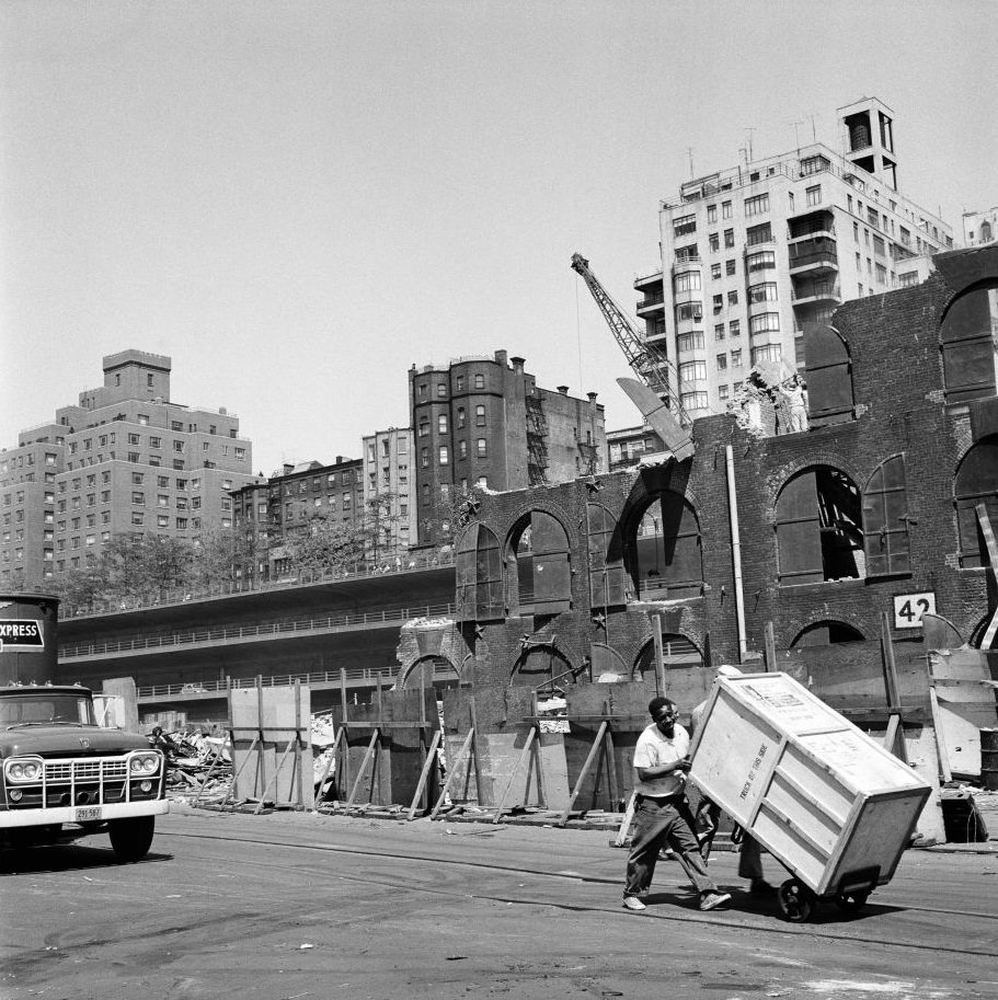 Men make delivery near construction site in Brooklyn Heights, March 1958.