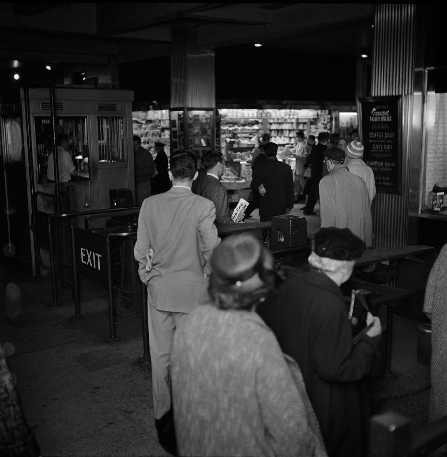 Commuters enter a subway station in Brooklyn Heights, March 1958.