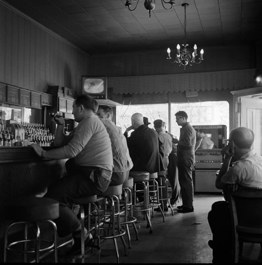 Men watch a televised baseball game in a bar in Brooklyn Heights, March 1958.