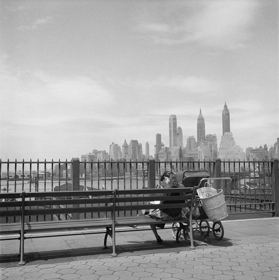 A young woman with a stroller on the Brooklyn Heights Promenade, March 1958.