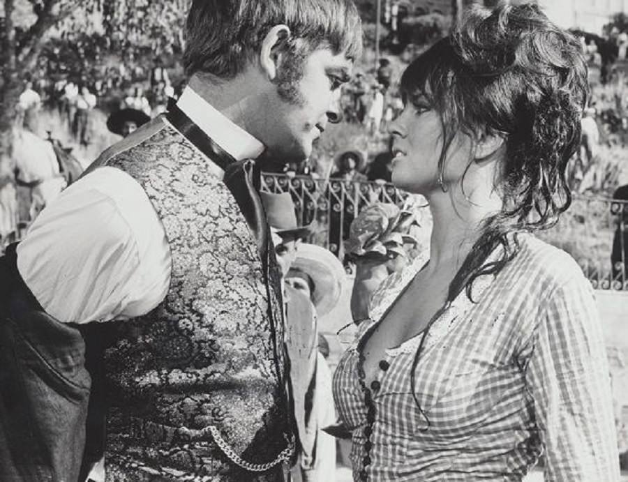 Caroline Munro with Richard Widmark in the movie 'A Talent for Loving', 1969.