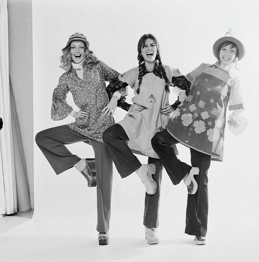 Caroline Munro with fashion models Nikki Ross and Lula wearing smock style tunics, 13th February 1972.