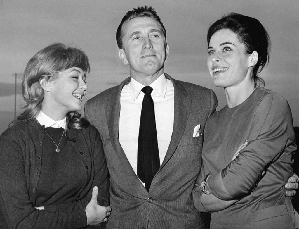Christine Kaufmann with Kirk Douglas and Barbara Rütting in the movie 'City without Pity', 1960.