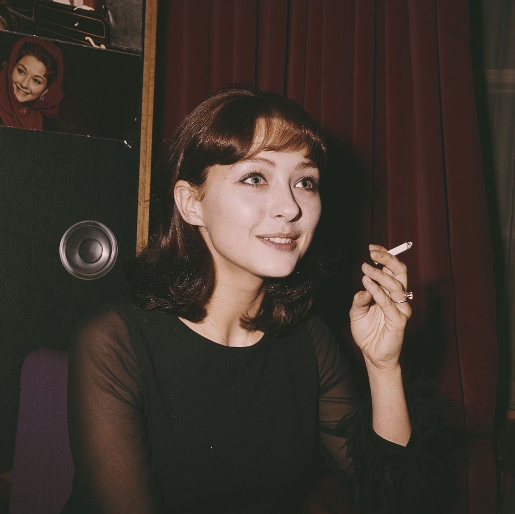 Christine Kaufmann smoking a cigarette in London in 1962.