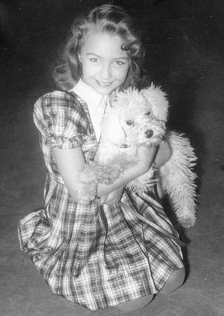 Christine Kaufmann with her poodle, 1954.