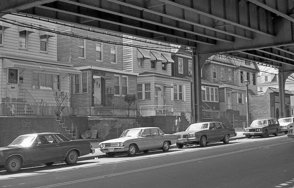 Residential homes on Roosevelt Avenue (near 112th Street), in the Corona neighborhood. Queens, New York, 1990.