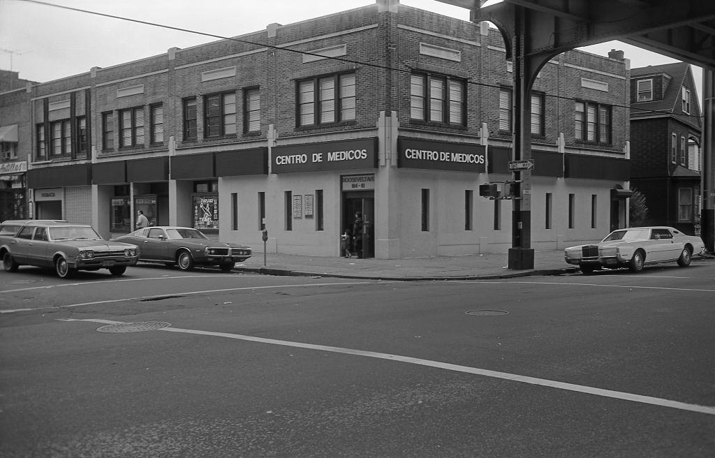 Spanish Medical Center and other small businesses along Roosevelt Avenue in Corona, Queens, 1974.