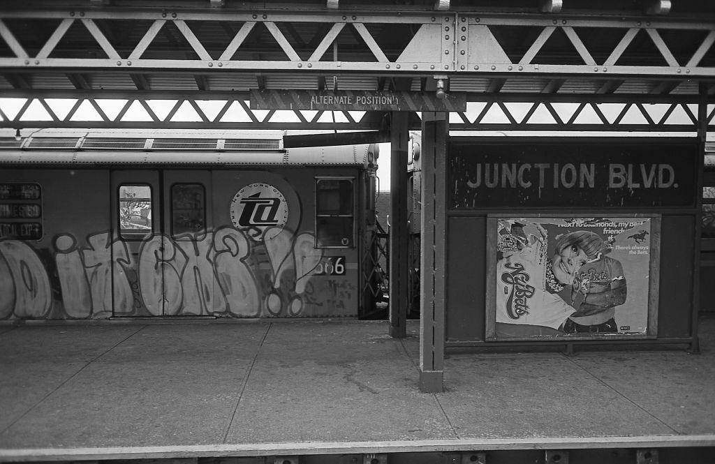 A graffiti covered subway train sits at the Junction Boulevard station in Corona, Queens, 1974.