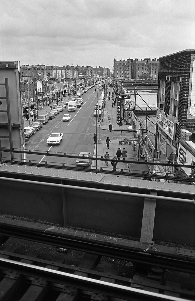 Elevated view from the Seven Train Subway platform of small businesses lining Roosevelt Avenue in the heart of Corona, Queens. 5th November 1974