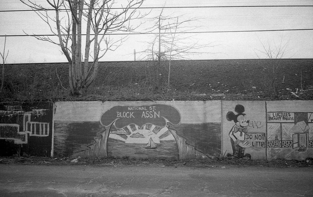 Graffiti on a retaining wall along 45th Avenue, in the Corona. Queens, New York, 1982.