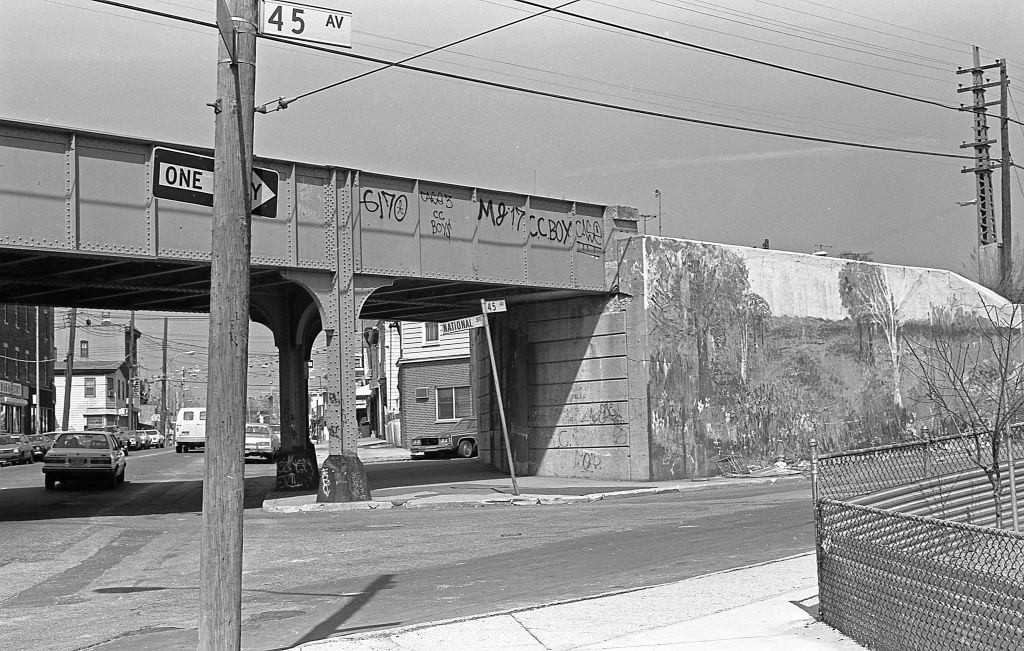 Subway line at the intersection of 45th Avenue and National Street, in the Corona neighborhood, Queens. Queens, New York, 1982.