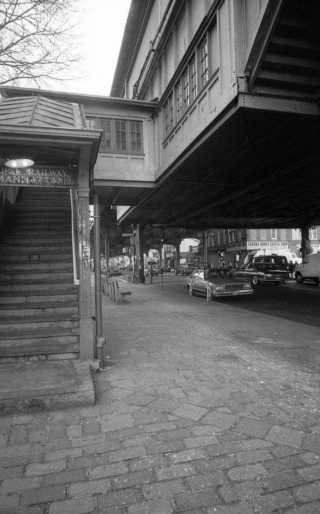 Staircase leading to the elevated subway line at the intersection of Roosevelt Avenue and National Street, in the Corona neighborhood of Queens, 1982.