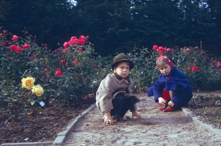 Children in the park around Egeskov Castle, Funen Island, Denmark