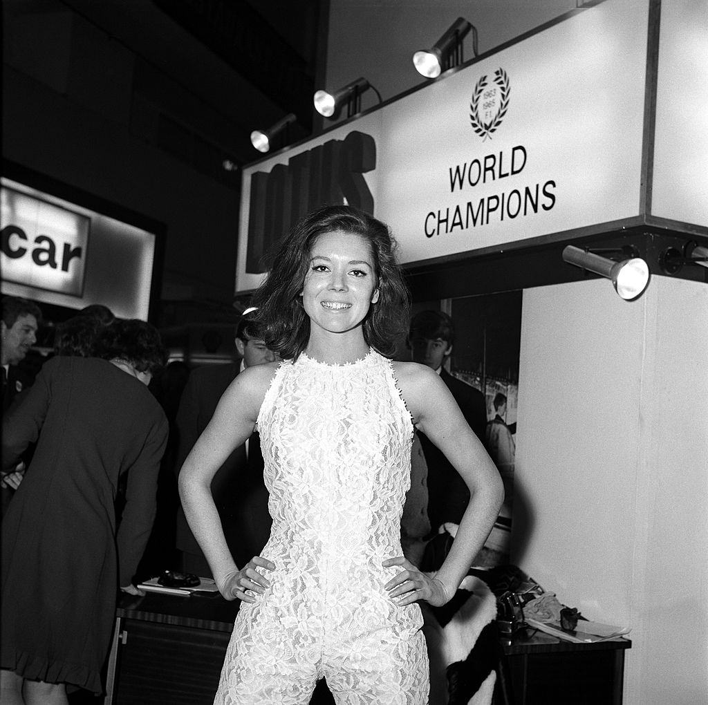 Diana Rigg on the Lotus stand at the London Motor Show at Earls Court, London in October 1965.