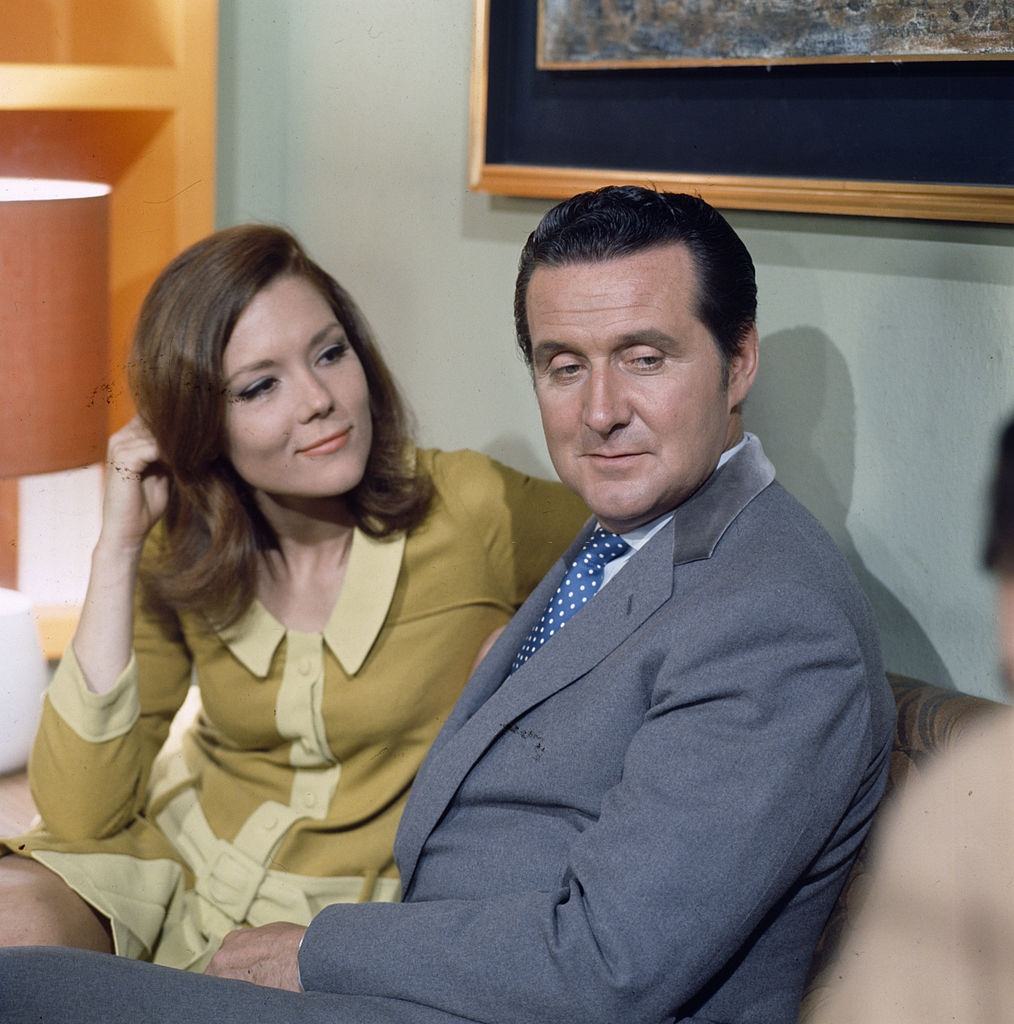 Diana Rigg and Patrick Macnee during the filming of the television series 'The Avengers' in 1967.