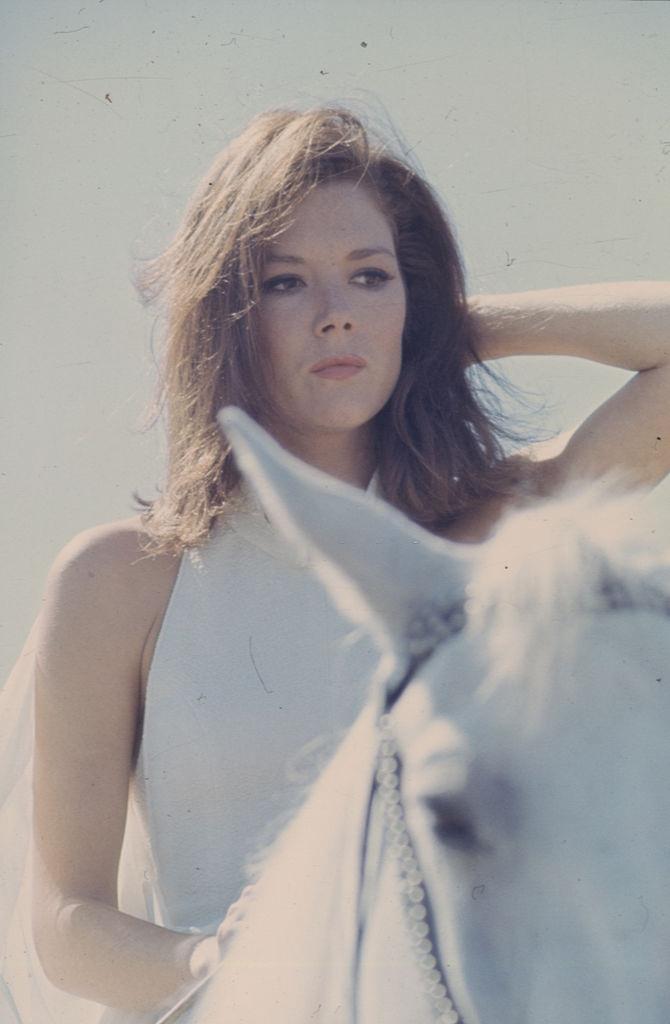Diana Rigg riding a horse, 1967.