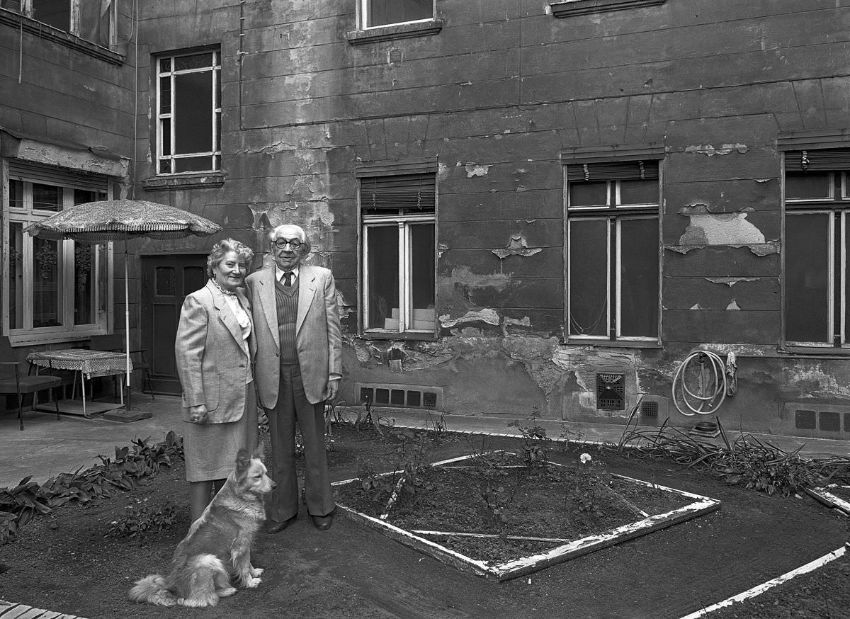 Herr and Frau Fleischer in their engagement outfits with their dog Putzi.