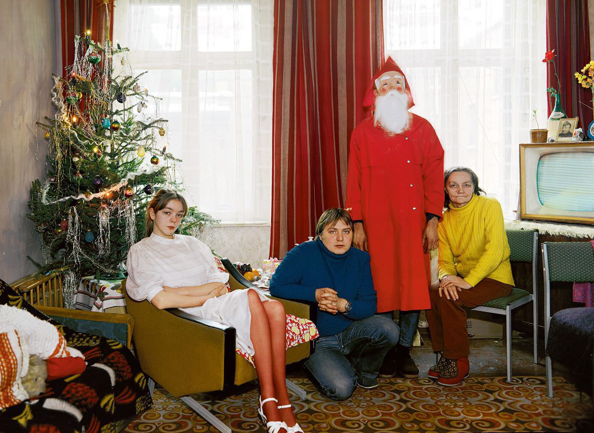 Margot Schulz, disabled retiree, with three of her fourteen children.