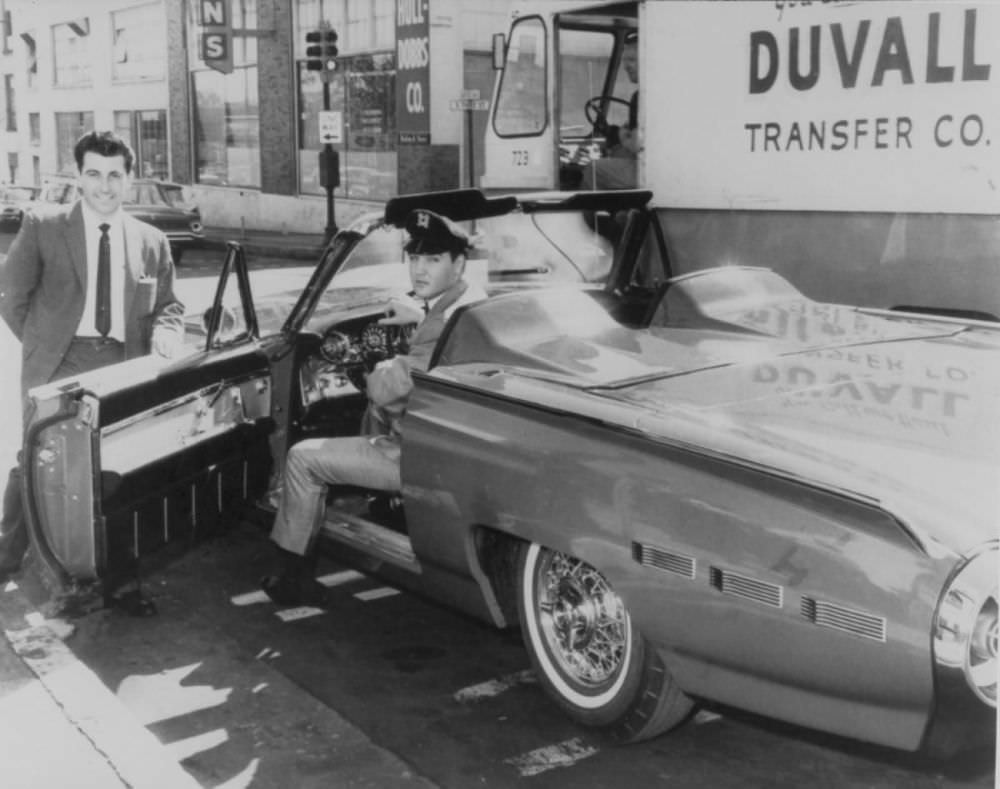 Elvis in a 1962 Ford Thunderbird Sports Roadster.