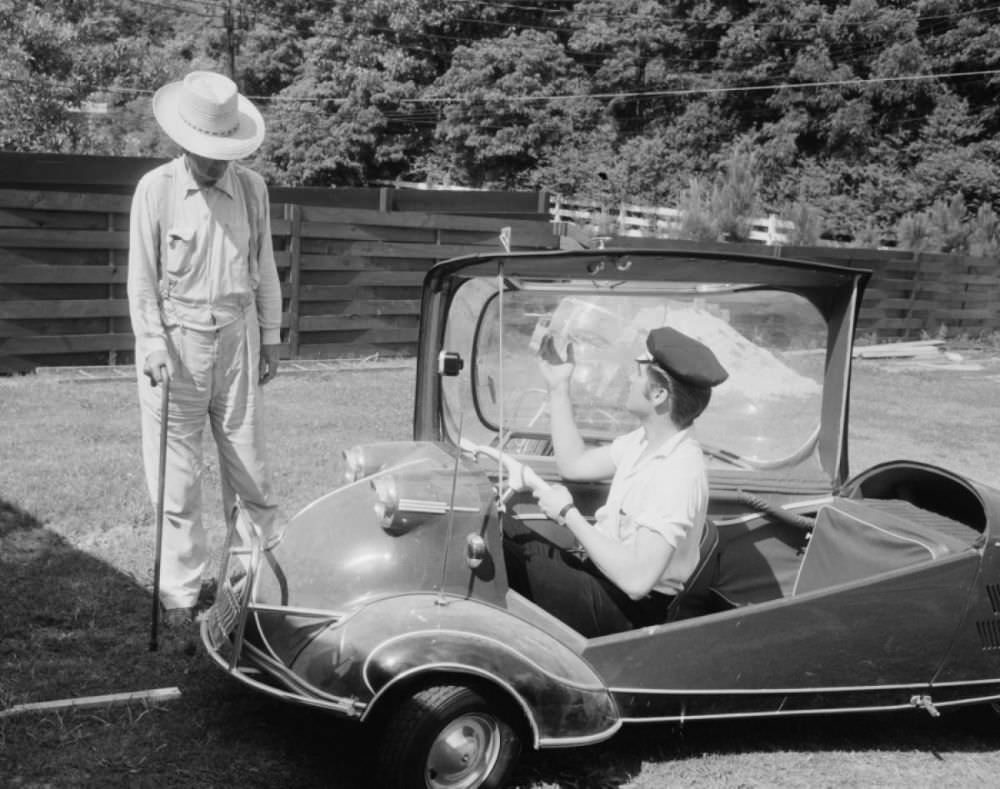 Elvis in a 1955 Messerschmitt KR 200. It was a three-wheeled, two-seated bubble car built by a German aircraft manufacturer.