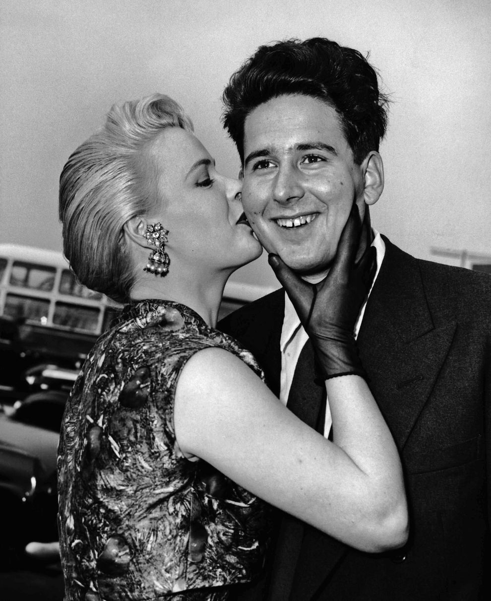 Lord Anthony Moynihan, 3rd Baron Moynihan, is greeted on arrival at Heathrow by ‘Miss Calypso of 1957’ Julia Martin, 1957.