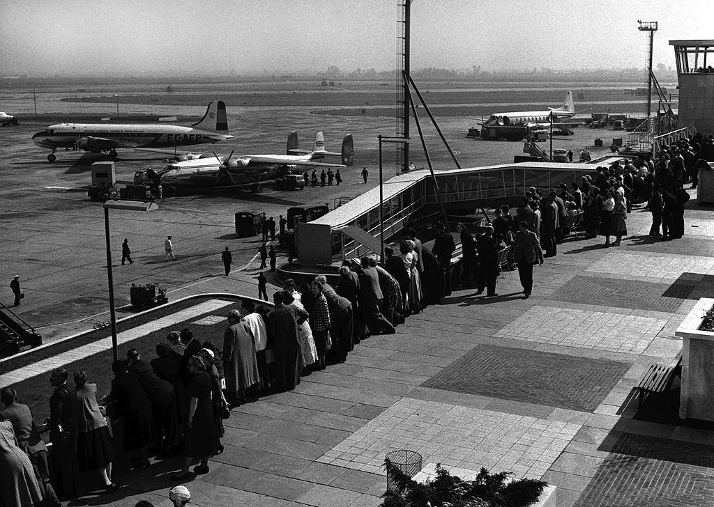 Apron and the flat roof where friends and family of traveling passengers can wave goodbye as the planes takeoff, 1955.