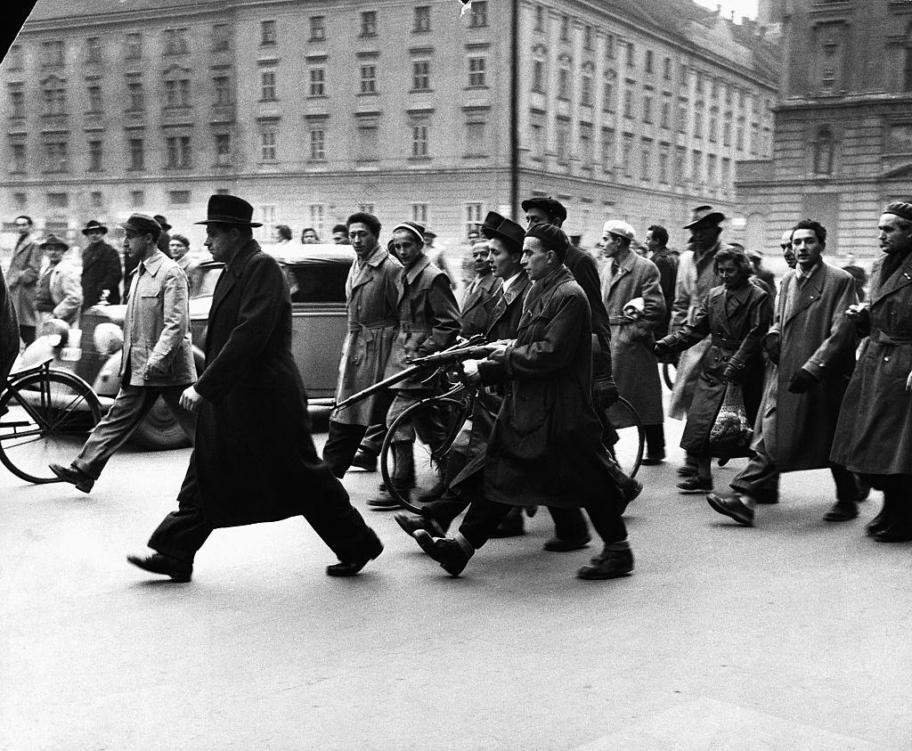 Hungarians arrest a member of the secret police during the revolution of 1956