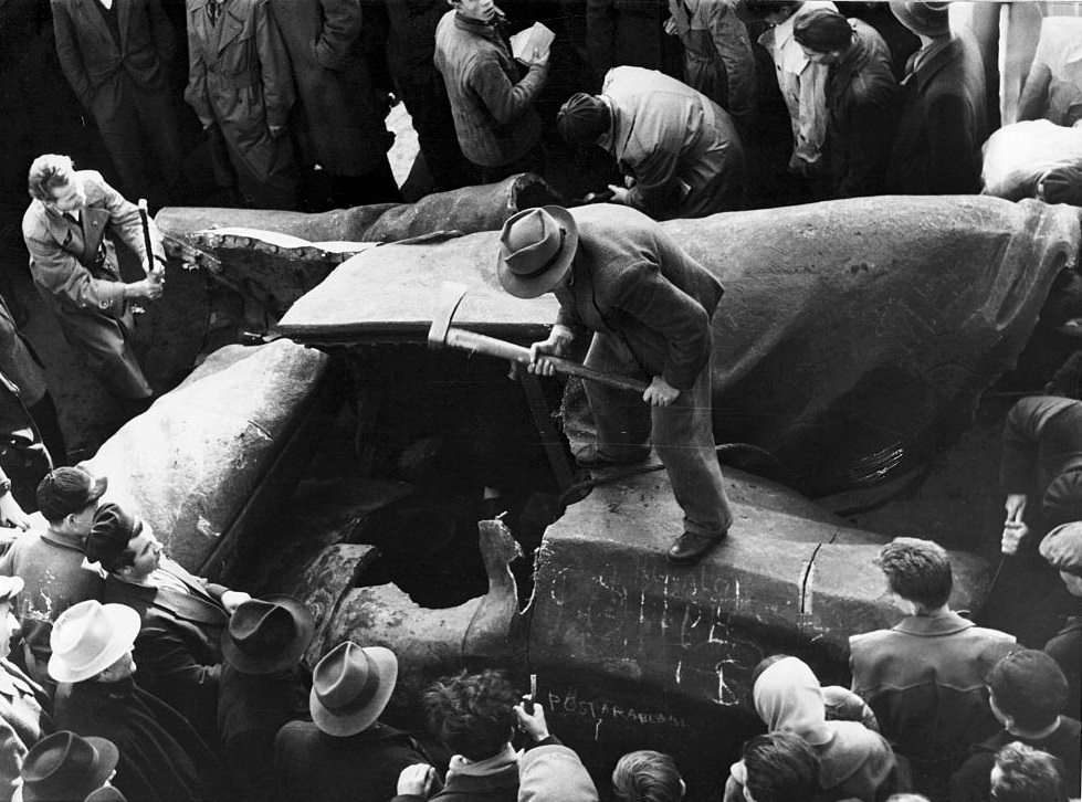 Giant statue of Stalin is chopped to pieces - near the National Theatre Budapest, 1956.