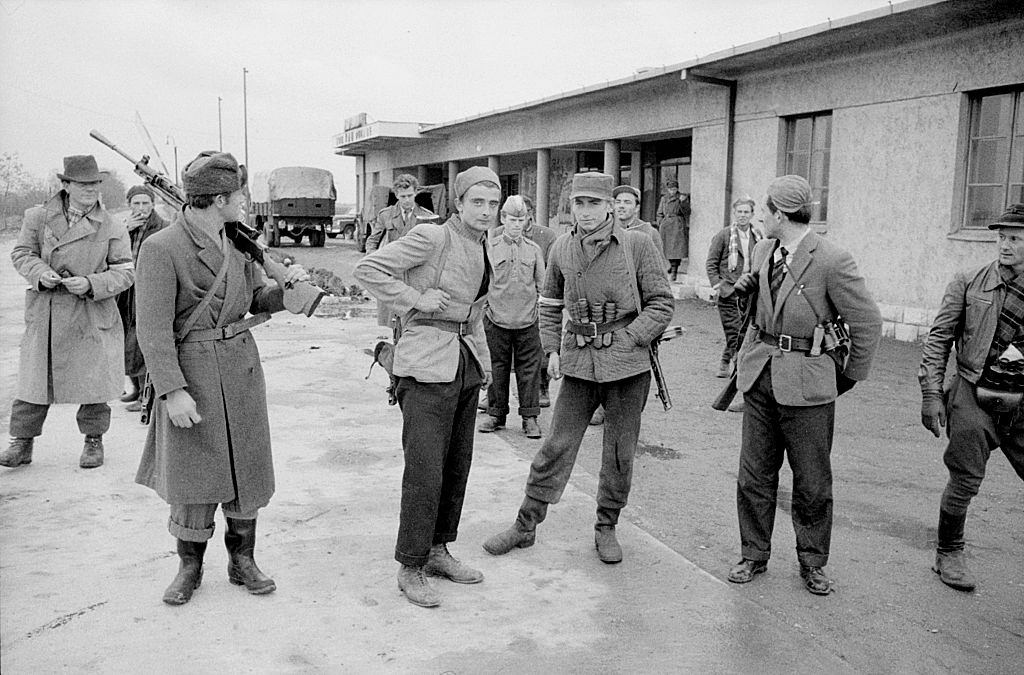 Some revolutionaries controlling the border between Austria and Hungary during the Hungarian uprising against the Soviet regime.