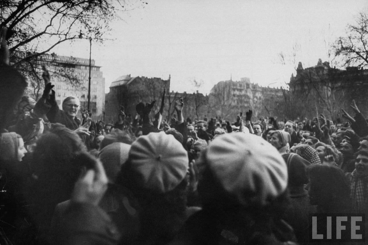 Hopeful Hungarian rebel demonstrators during revolution against Soviet-backed regime.