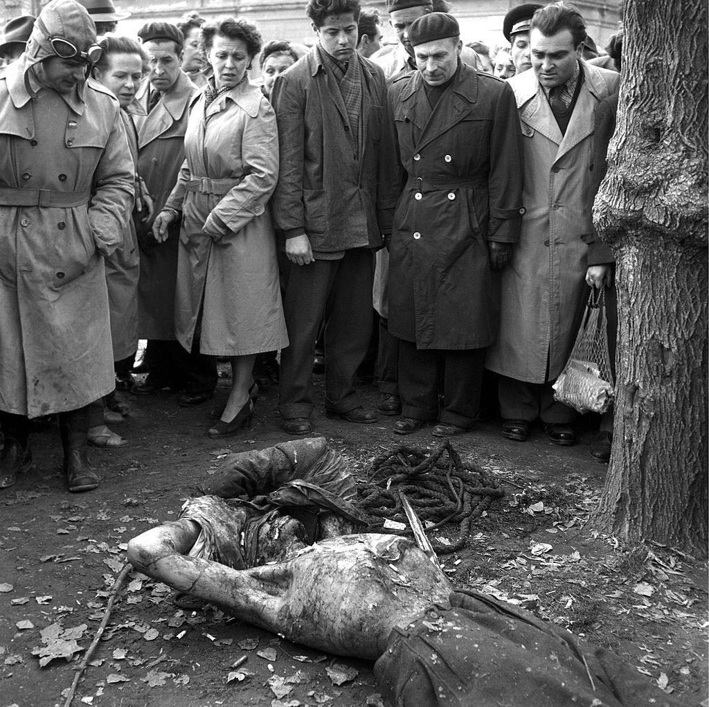 People looking at the deceased body, 1956.