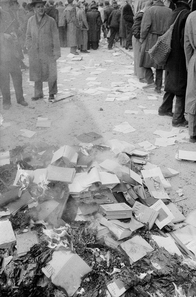 Rebels setting fire to Marxist books. Budapest, October 30, 1956.