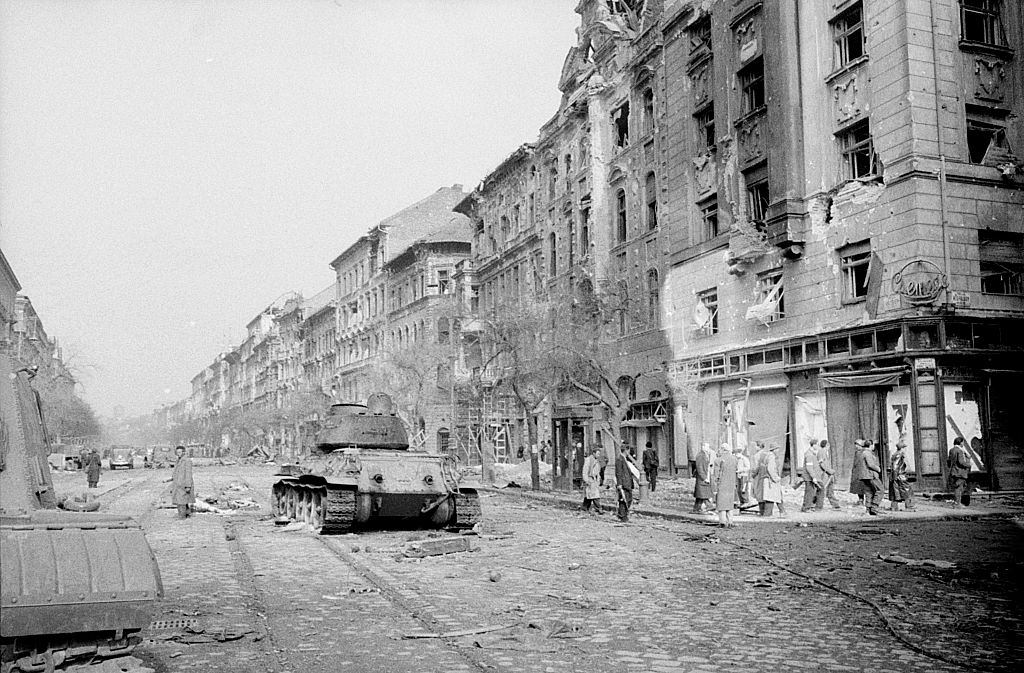 A panzer standing in a street of the capital destroyed by the fights.