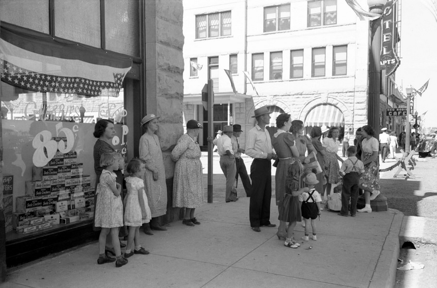 Spectators await the fourth of July parade in downtown Vale, Oregon, on the corner of Main Street and A Street.