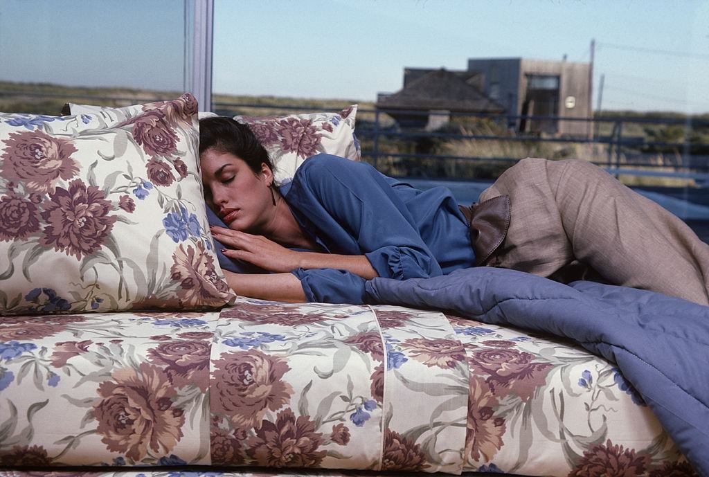 Janice Dickinson dressed in a blue silk shirt, 1978.