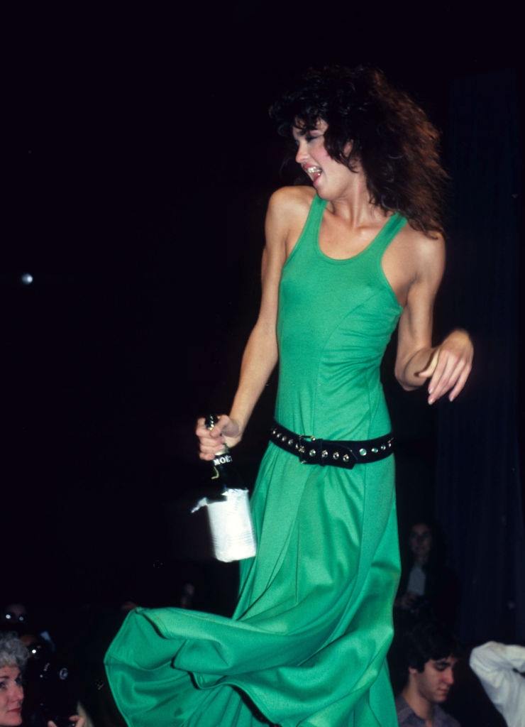 Janice Dickenson wearing a green dress in Betsey Johnson Fashion Show, 1981.