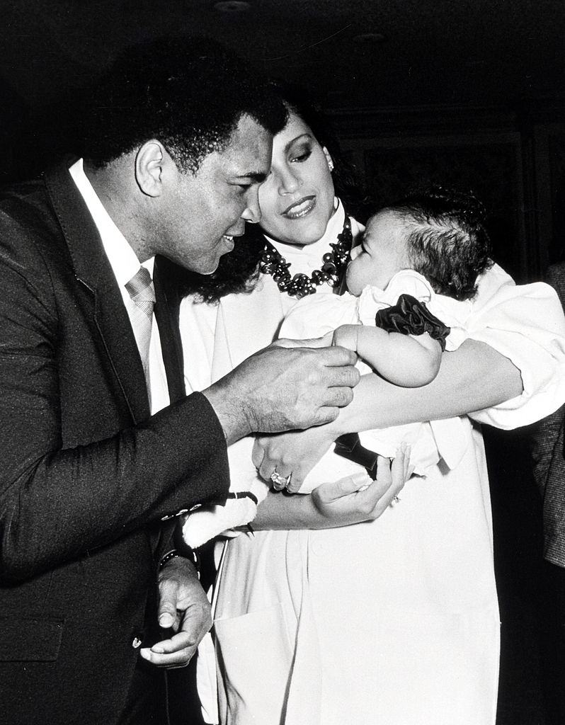 Jayne Kennedy with Muhammad Ali and a child during Press Conference For Children's Peace Foundation, 1986.