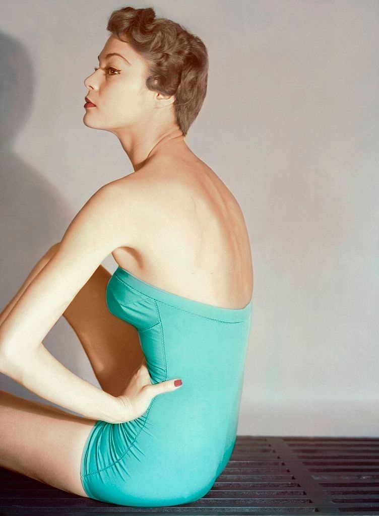 Jean Patchett in a grass green nylon with laton swimsuit, 1950.